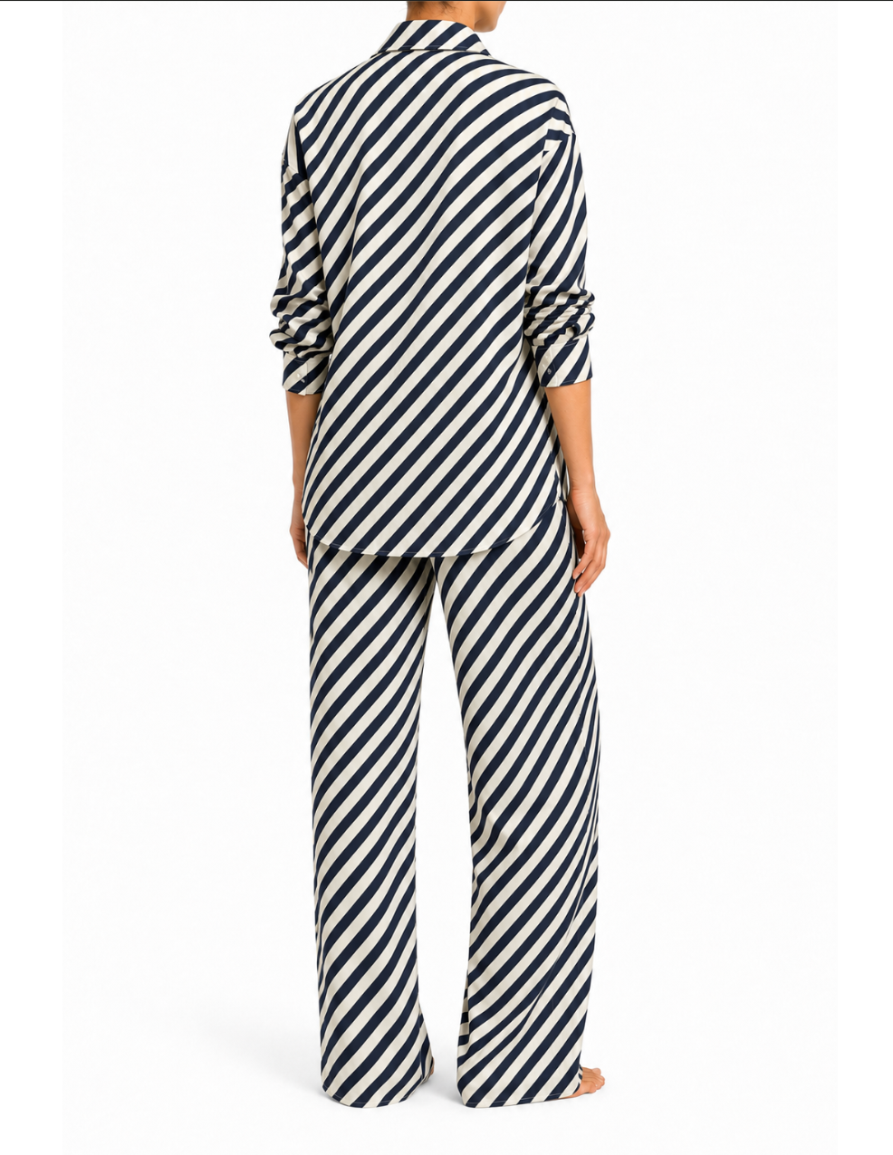 Model wearing the ROEM Anse Pant in Indigo, styled with the Gallion Top, back view
