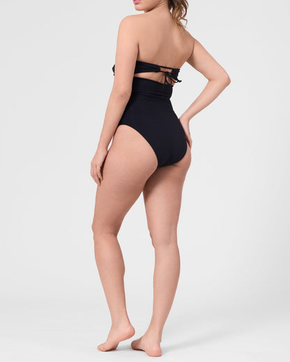 Model wearing the ROEM Bartolome Bandeau Top One Piece in Black, back view