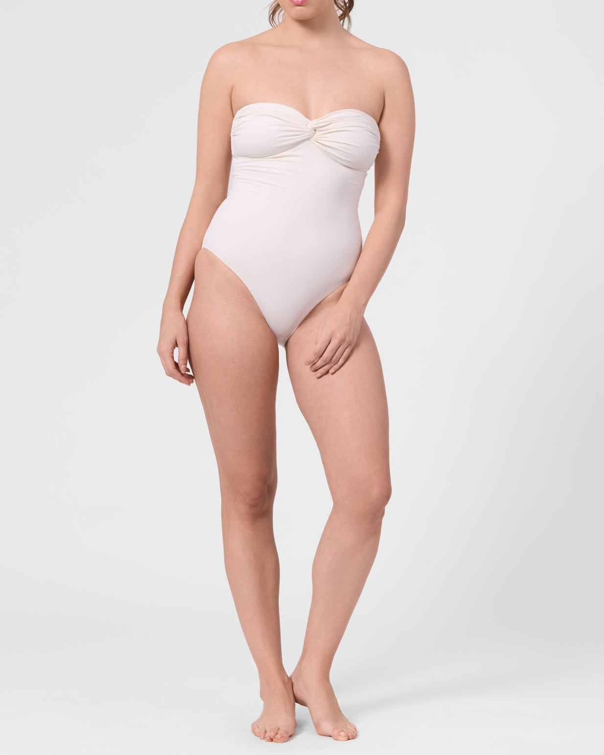 Model wearing the ROEM Bartolome Bandeau Top One Piece in Pearl, front view