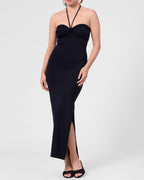 Model wearing the ROEM Bartolome Twist Top Dress in Black, front view