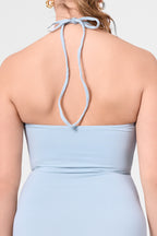 Detail shot of the ROEM Bartolome Twist Top Dress in Pool, halter tie detail