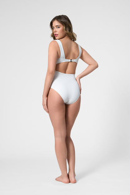 Model wearing the ROEM Calabria One Piece in Pearl, back view