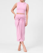 Model wearing the ROEM Itaso Front Wrap Skirt in Bloom, styled with the Grace Top, front view