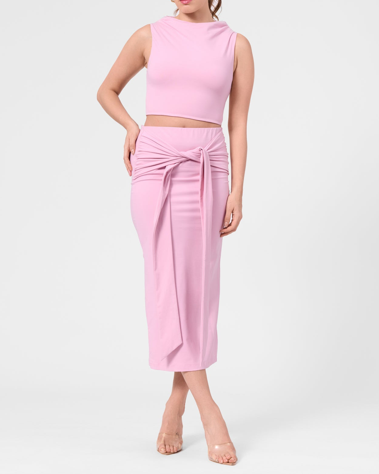 Model wearing the ROEM Itaso Front Wrap Skirt in Bloom, styled with the Grace Top, front view