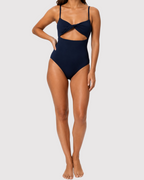 Model wearing the ROEM Santa Cruz One Piece in Indigo, front view