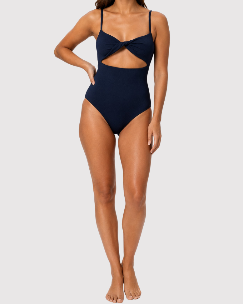 Model wearing the ROEM Santa Cruz One Piece in Indigo, front view